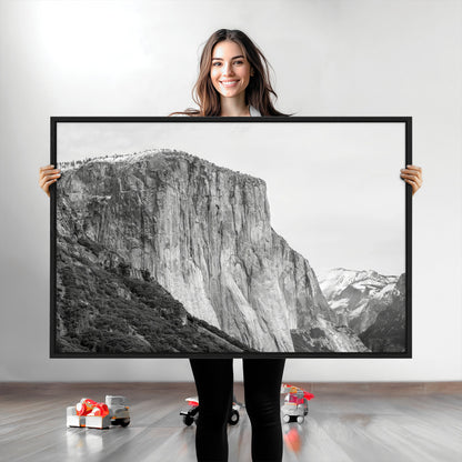 Monochrome canvas of El Capitan’s granite wall in Yosemite with snowy peaks, ideal for dramatic mountain or black-and-white nature decor.