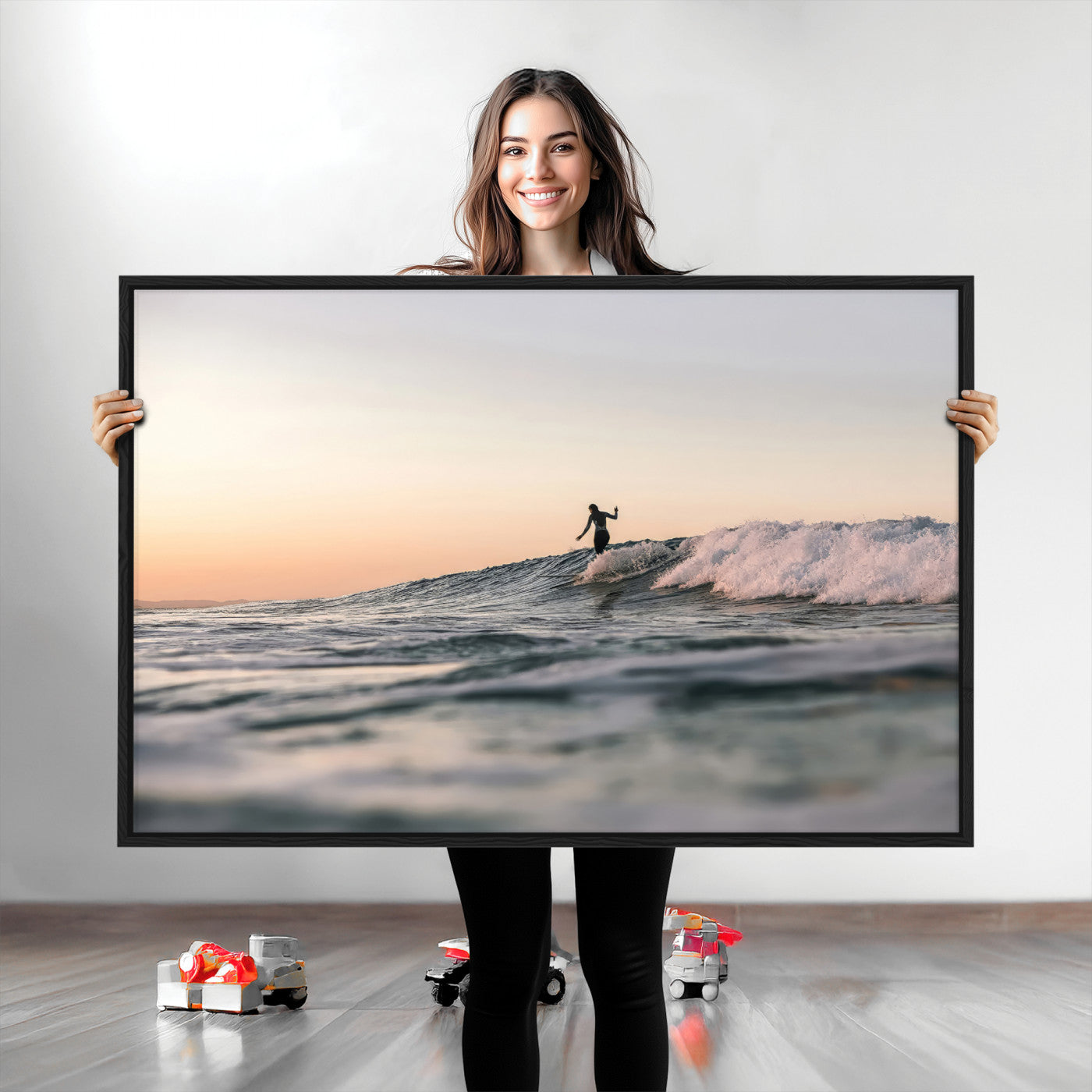 Framed canvas of a female surfer balancing on a wave at sunset, perfect for serene surf or ocean-inspired coastal decor.