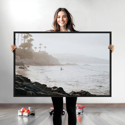 Framed canvas of a surfer in misty coastal tones at a foggy California beach, ideal for minimalist coastal beach or serene ocean-themed decor.