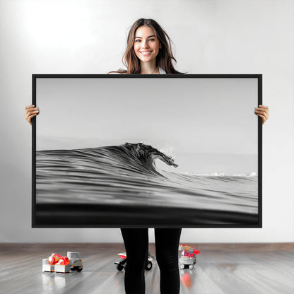Striking black and white photo of a curling wave, ideal for modern coastal or minimalist wall decor settings.