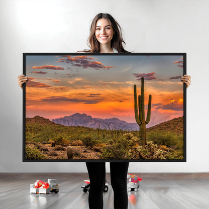 Vibrant desert sunset with saguaro cacti and distant mountains, perfect for Southwestern or warm-toned home decor.