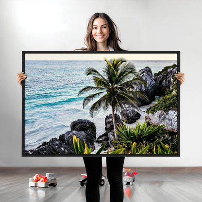 Framed canvas of a vibrant tropical coastline with palm trees, rocky cliffs, and turquoise waters, ideal for tropical coastal home decor.