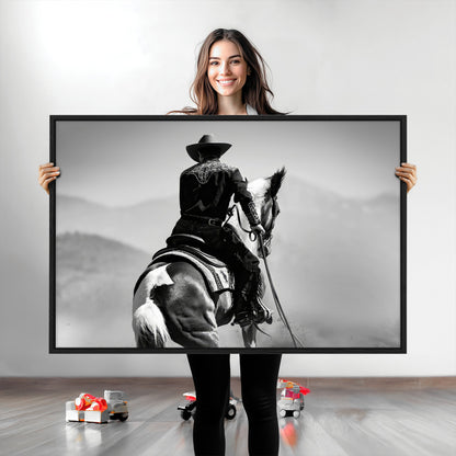 Black and white canvas of a cowboy on horseback with moody tones, perfect for rustic western or country-inspired home decor.