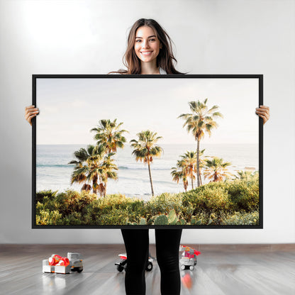 Framed print of sunlit palm trees on the California coast with warm tones, perfect for coastal minimalist or beach-style home decor.