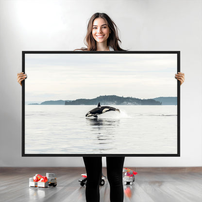 An orca jumping out of calm ocean waters with a misty island in the background, creating a serene and minimalist marine wildlife scene.