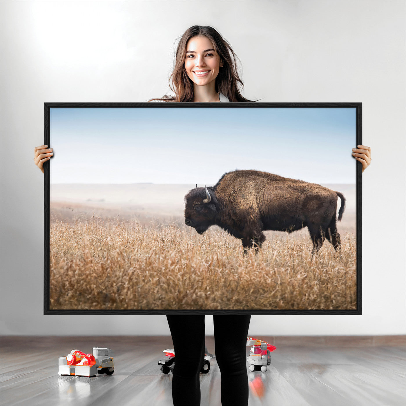 A majestic bison standing in an open prairie field, its strong form blending into the golden grass under a vast blue sky, evoking the wild spirit of the American plains.