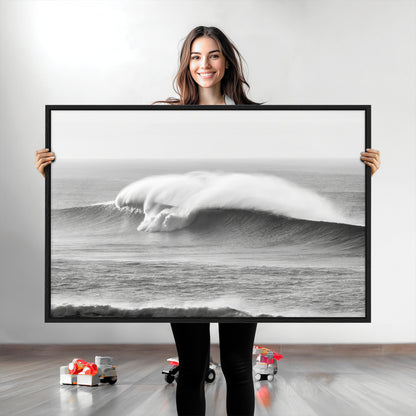 A dramatic black and white ocean wave crashing with immense force, capturing the raw power and movement of the sea in a bold seascape.