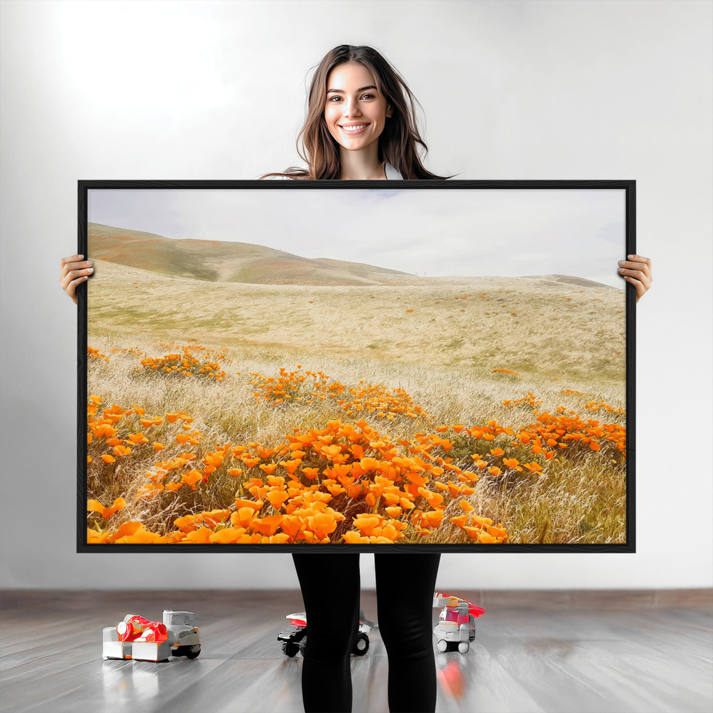 A golden field with vibrant orange poppies blooming across rolling hills under a soft, sunlit sky, creating a warm and rustic landscape.