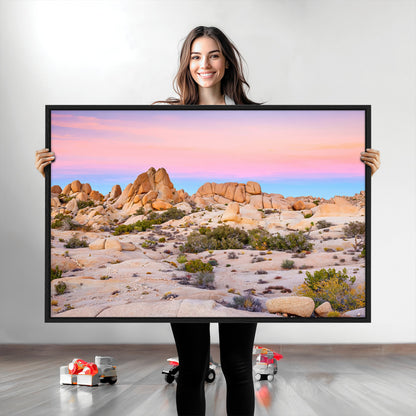 A breathtaking desert landscape featuring rugged rock formations under a vibrant pastel sunset sky, capturing the warmth and serenity of a Southwestern wilderness.