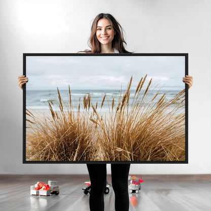 Canvas of golden beach grass swaying by the ocean under a soft cloudy sky, perfect for neutral-toned or coastal minimalist decor.
