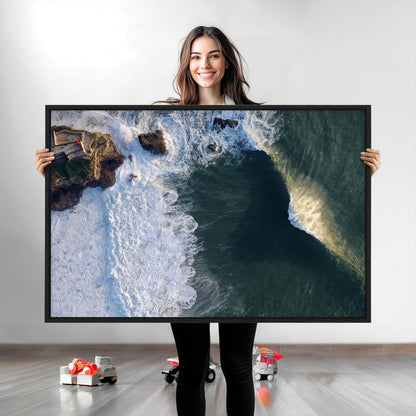 Canvas showing an aerial view of crashing waves along the Nazaré coastline, perfect for dramatic coastal or ocean-themed home decor.