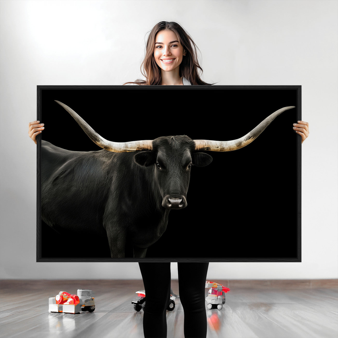 Close-up of a black Texas longhorn with large curved horns on black background, ideal for rustic farmhouse or modern western interiors.