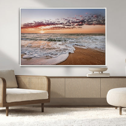 Canvas of a sunset over a foamy ocean shore with warm light and gentle waves, ideal for coastal or beach-themed home decor.