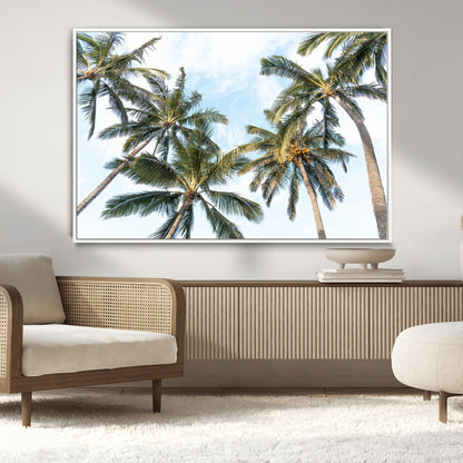Framed canvas of tall palm trees reaching into a tropical sky, ideal for beach home or relaxed island-inspired wall decor.
