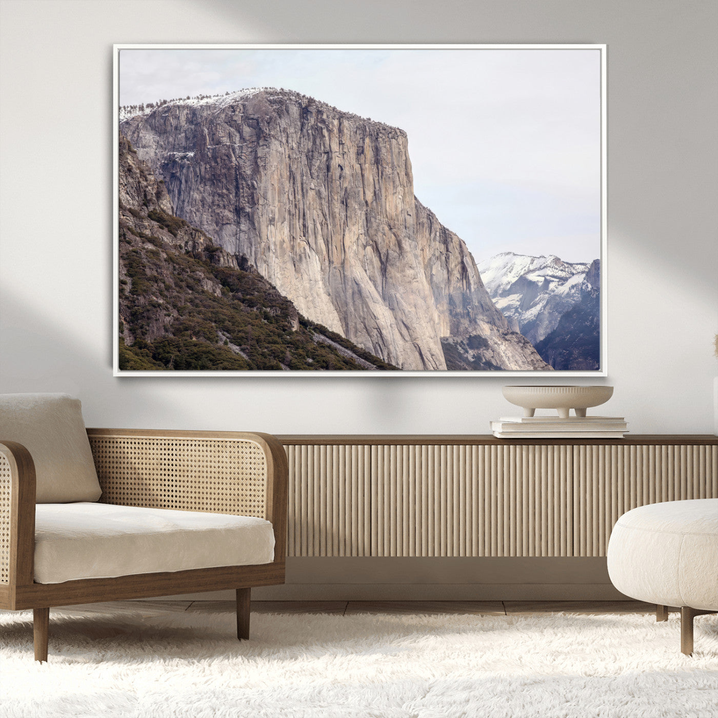 Framed canvas of El Capitan’s vertical granite face in Yosemite with snowy peaks, ideal for Sierra minimalism or mountain-inspired decor.