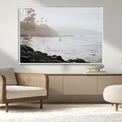 Framed canvas of a surfer in misty coastal tones at a foggy California beach, ideal for minimalist coastal beach or serene ocean-themed decor.