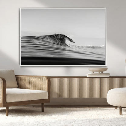 Striking black and white photo of a curling wave, ideal for modern coastal or minimalist wall decor settings.