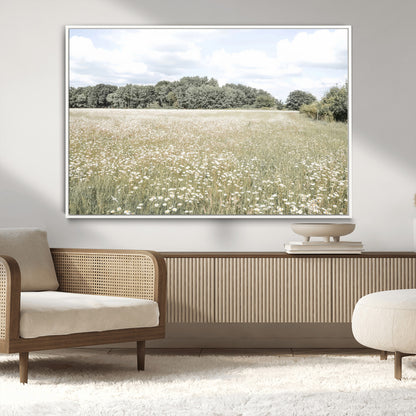 Soft-toned image of a wild daisy field under a cloudy sky, ideal for neutral or Scandinavian-inspired home decor.