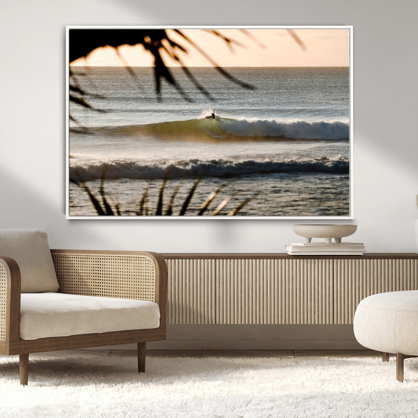 Photo of a surfer riding a golden hour wave at sunset, with tropical tones and dreamy light, perfect for tropical boho or coastal home decor.