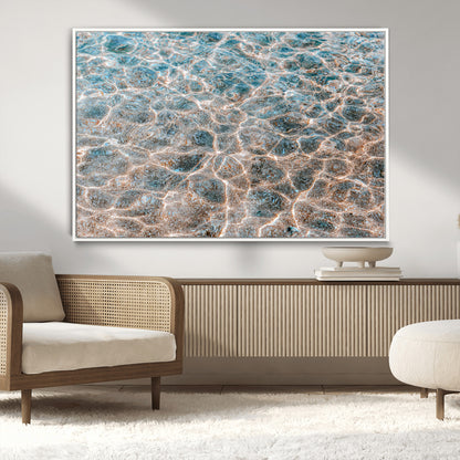 Close-up of sunlit ocean ripples with aqua blue and golden tones, ideal for modern coastal or minimalist home decor.
