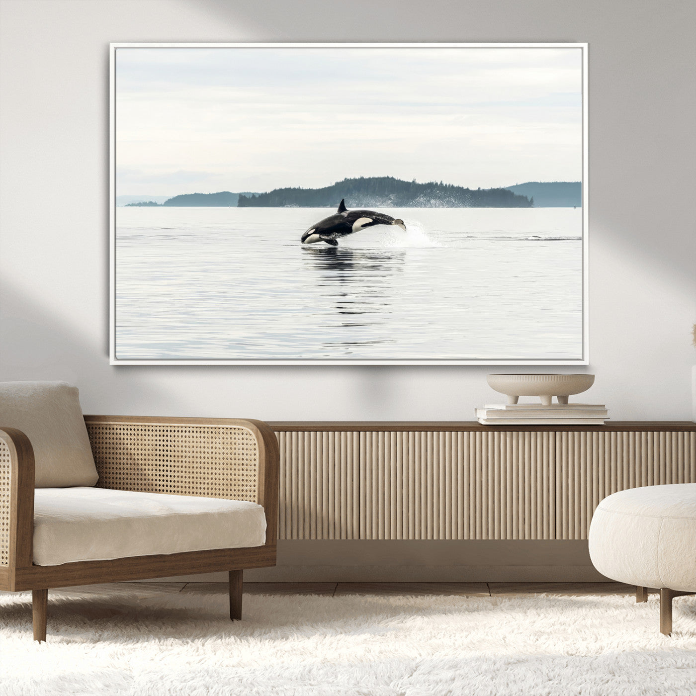 An orca jumping out of calm ocean waters with a misty island in the background, creating a serene and minimalist marine wildlife scene.