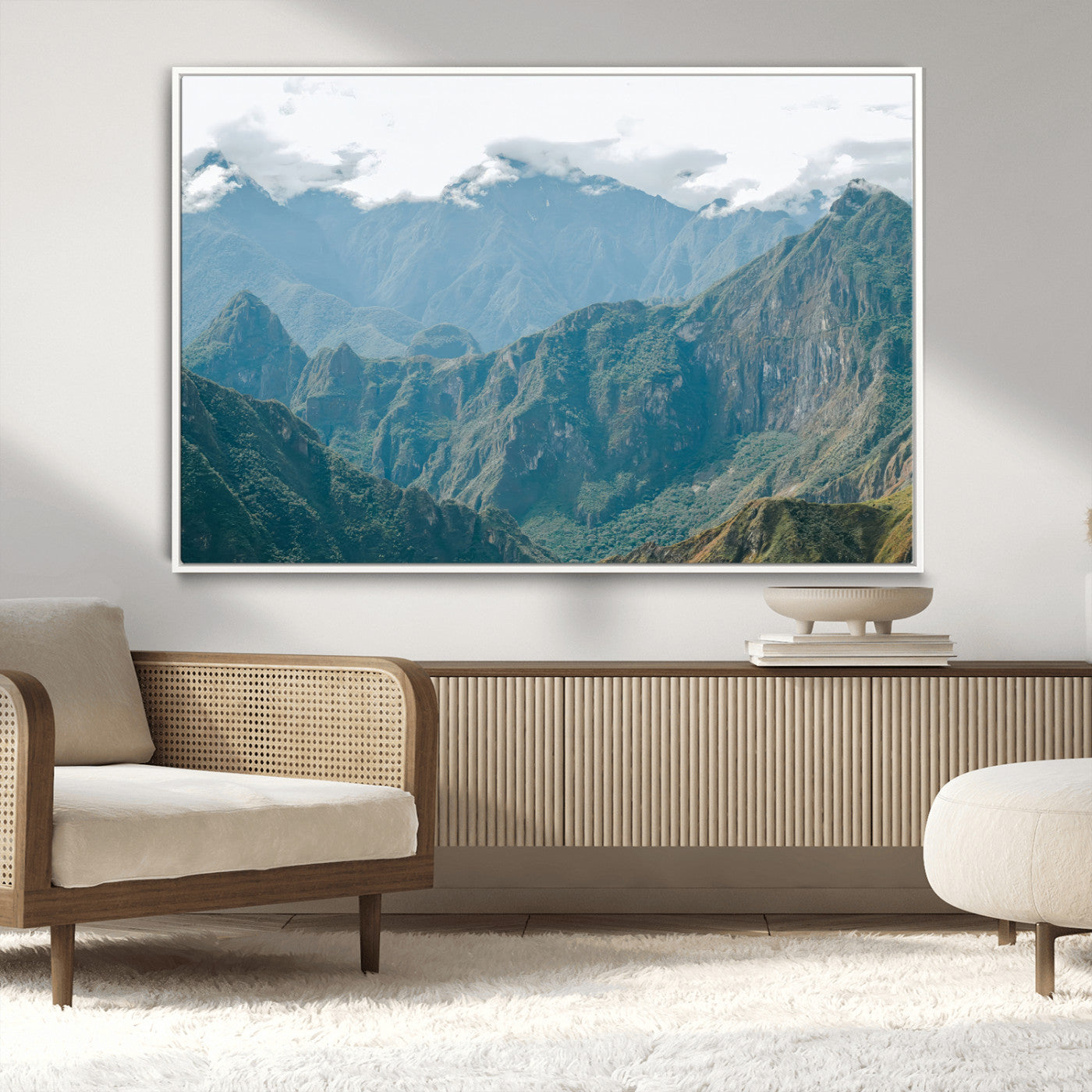 A misty mountain landscape with cloud-covered Andean peaks and lush green valleys, creating a dramatic and serene view, perfect for rustic or nature-inspired home decor.