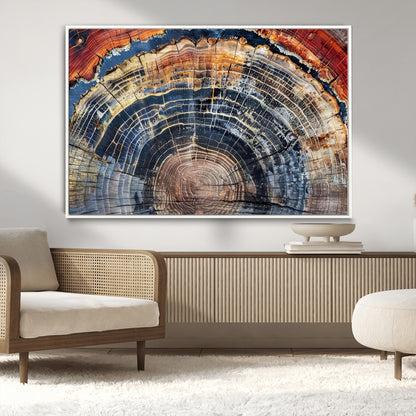 Vibrant tree ring with orange, brown, and blue tones in abstract detail, perfect for rustic or boho-inspired wall decor.
