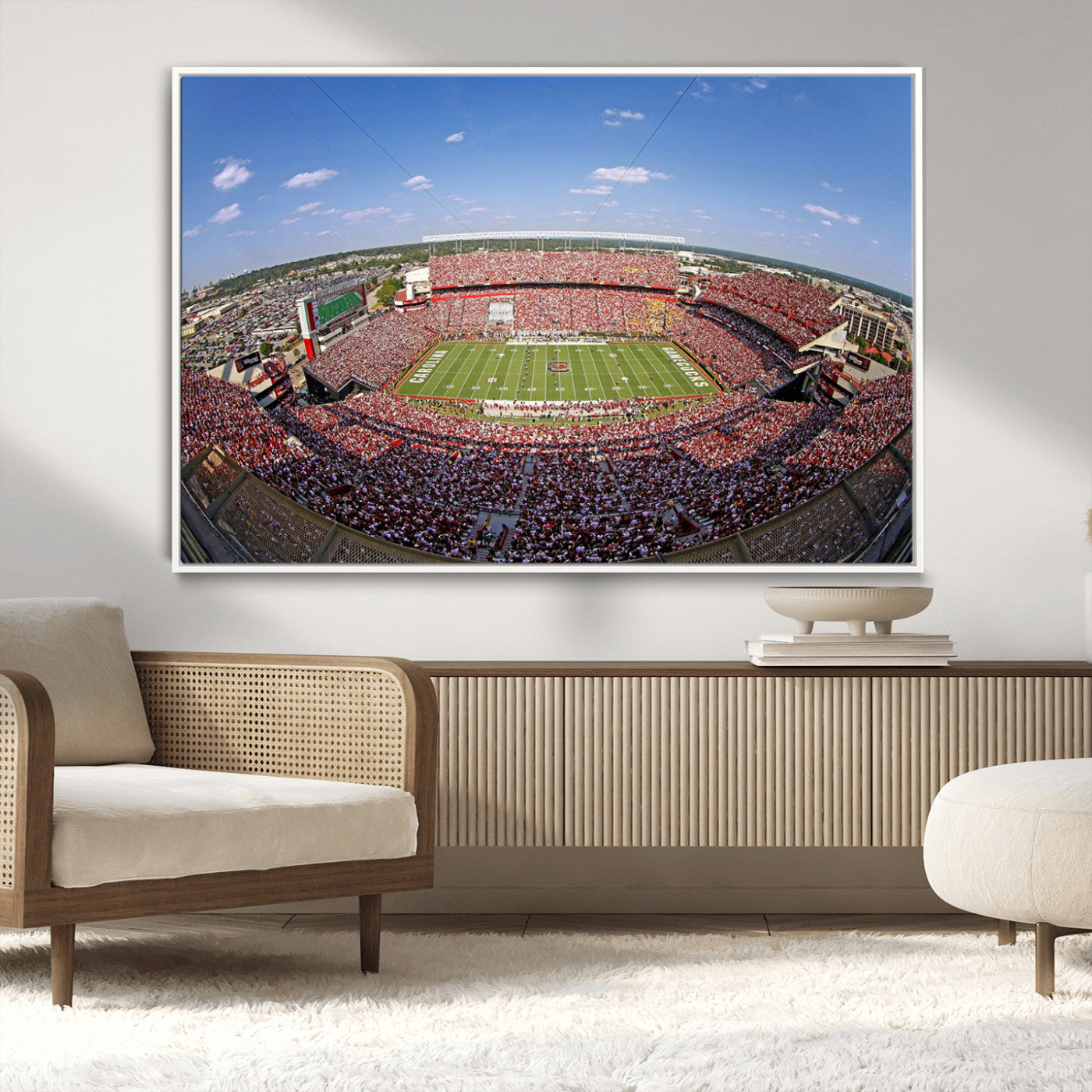 An William Brice-Stadium view of a full football stadium with cheering fans and clear blue skies, capturing the excitement and energy of the game.