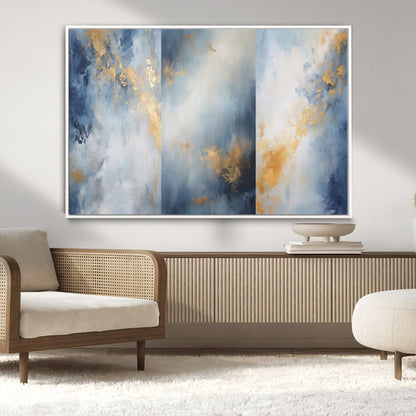 Abstract canvas art in soft blue and gold tones with textured brushstrokes, ideal for elegant or modern neutral decor spaces.