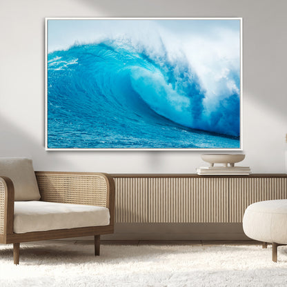 Vibrant canvas of a powerful curling ocean wave in tropical blue tones, perfect for coastal or surf-inspired decor settings.