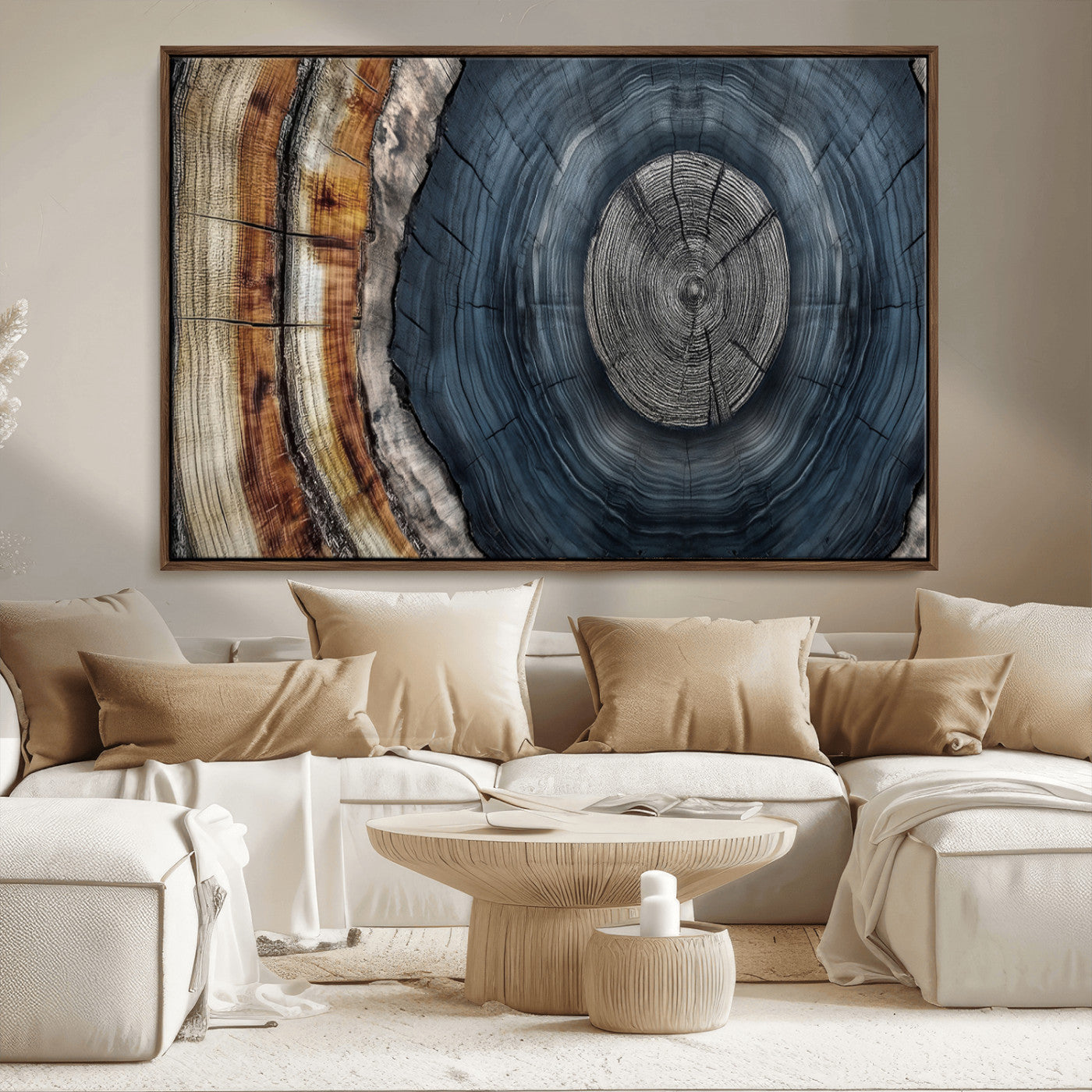 A stunning close-up of a tree trunk showing the intricate, circular growth rings, showcasing the natural textures and rich contrasts in deep blues, browns, and silvers.