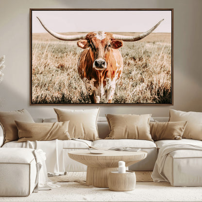 Framed longhorn cow canvas wall art with rustic prairie background, western animal print perfect for farmhouse or ranch style decor