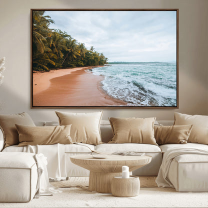 Framed canvas of a tropical beach with palm trees and soft waves, ideal for coastal escape or serene nature-inspired home decor.