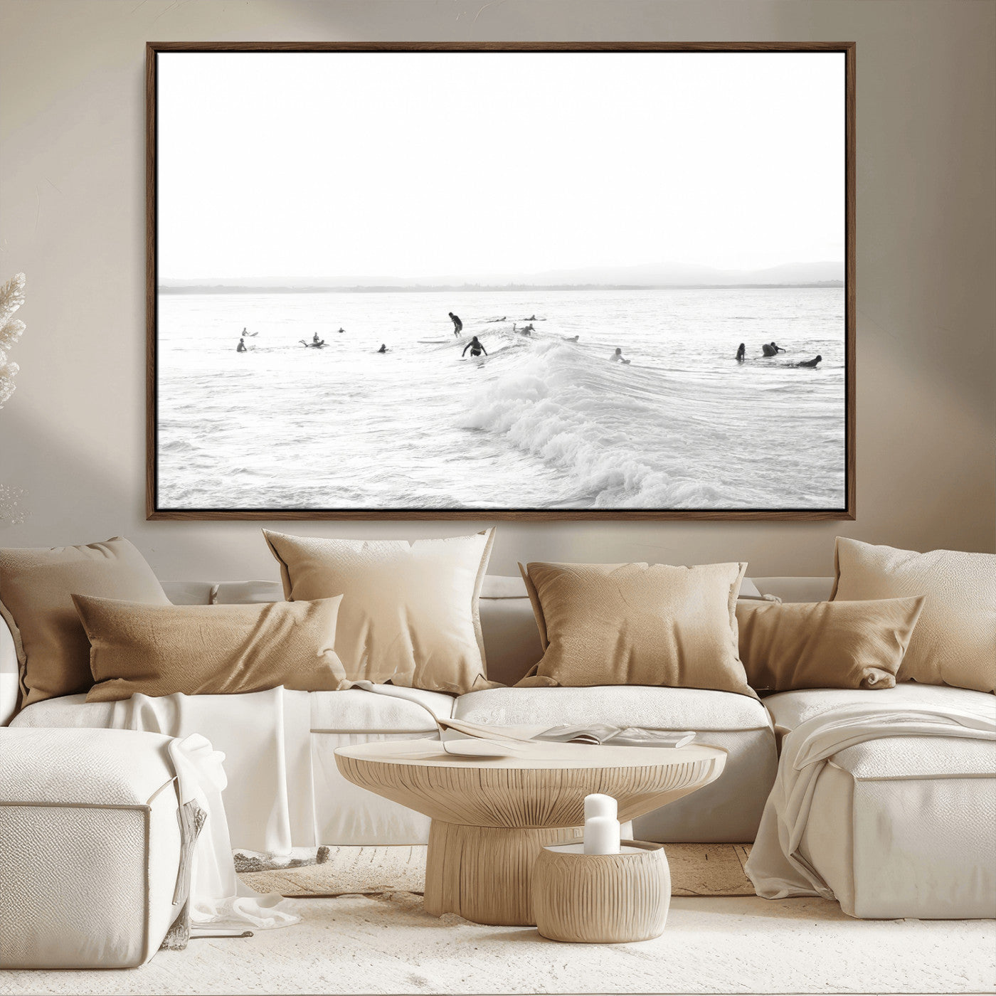 Monochrome photo of surfers riding and waiting on ocean waves, ideal for surf-themed or coastal energy wall decor.