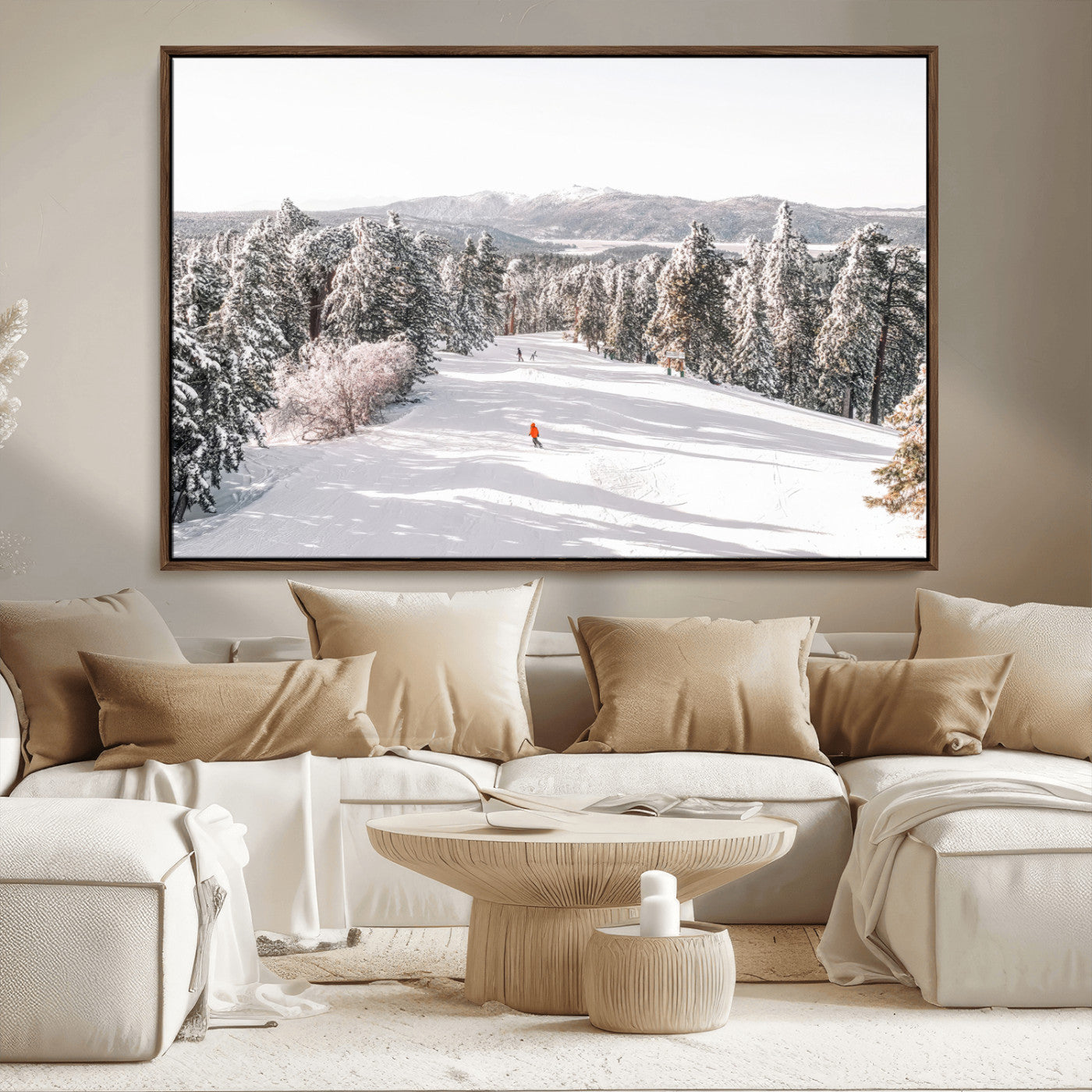 Bright ski trail lined with snow-covered pines and a skier in orange, perfect for alpine adventure or winter sports-inspired decor.