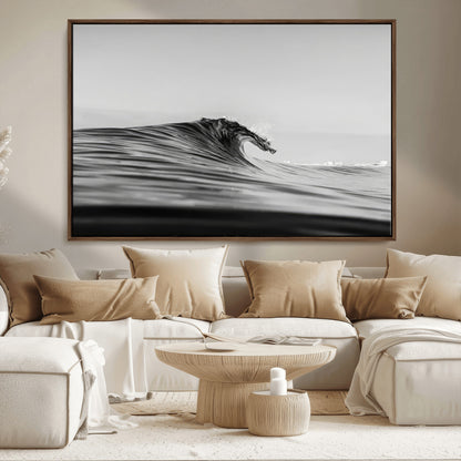 Striking black and white photo of a curling wave, ideal for modern coastal or minimalist wall decor settings.