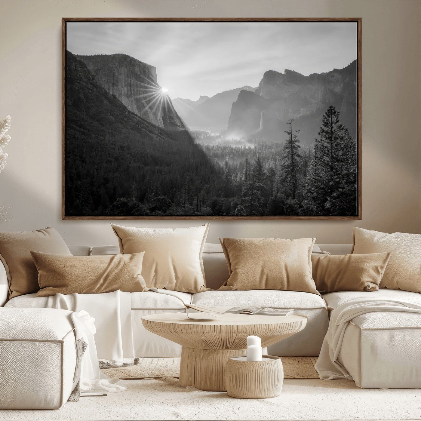 Black and white landscape of Yosemite with sun rays peeking over El Capitan, ideal for moody nature or modern rustic decor.