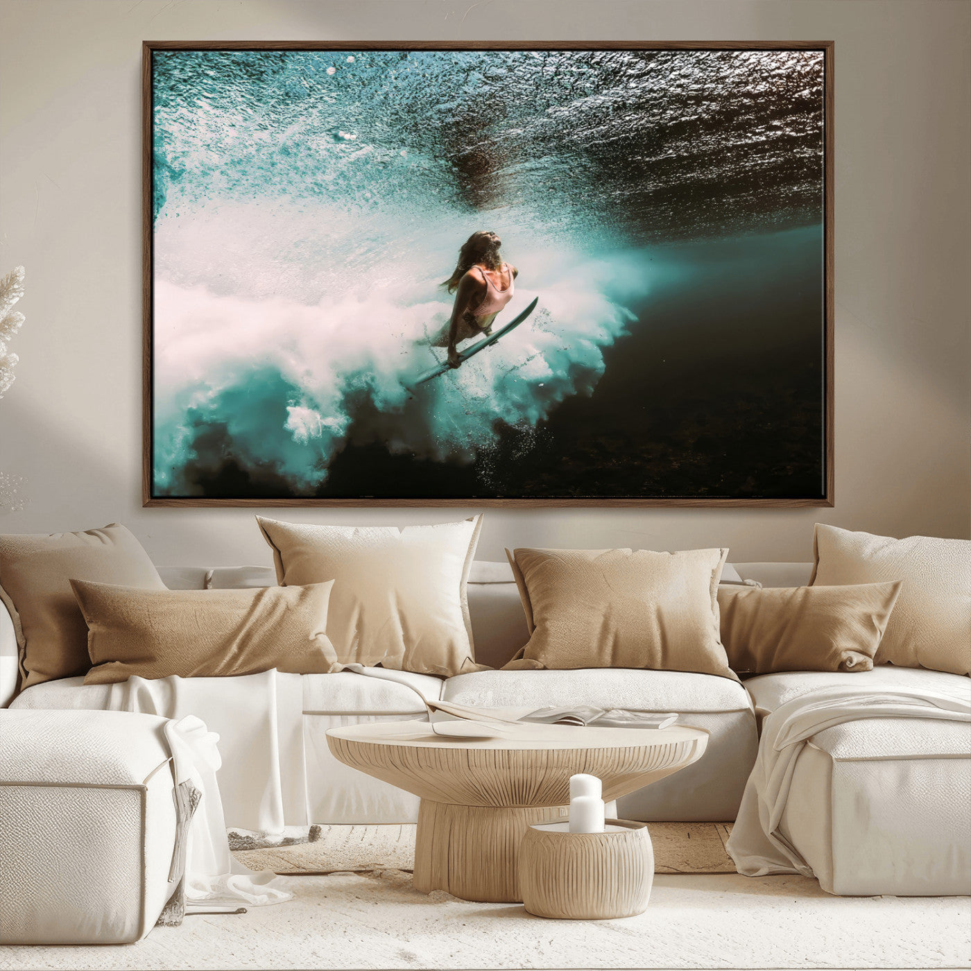 Vibrant underwater photo of a female surfer diving through turquoise waves, perfect for coastal boho or surf-inspired home decor.