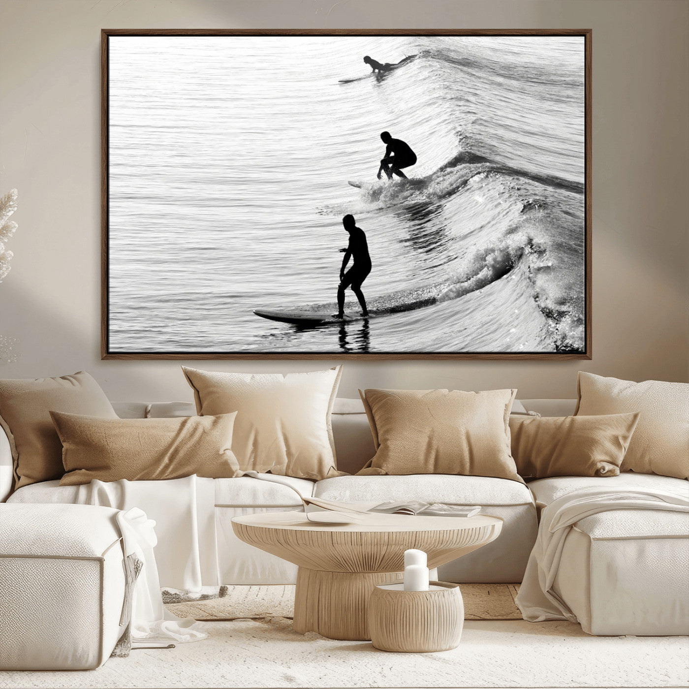 Black and white photo of surfers riding waves in a moody, high-contrast scene, ideal for modern coastal or surf-inspired home decor.