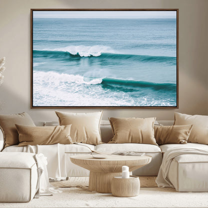 Powerful ocean waves rolling towards the shore, their turquoise hues blending with white sea foam under an open horizon, capturing the essence of the ocean's movement.