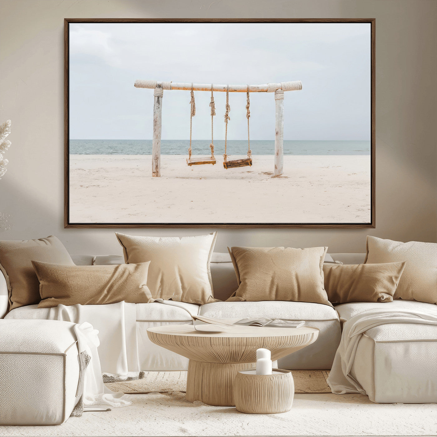 A rustic wooden beach swing stands on a serene sandy shore with an ocean horizon in the background, creating a tranquil and dreamy coastal escape.