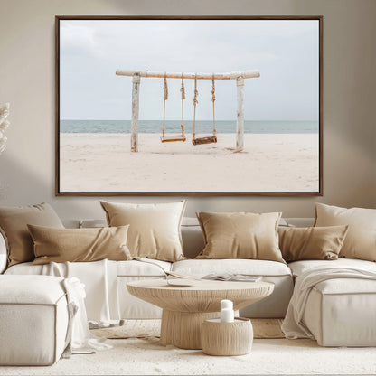 A rustic wooden beach swing stands on a serene sandy shore with an ocean horizon in the background, creating a tranquil and dreamy coastal escape.