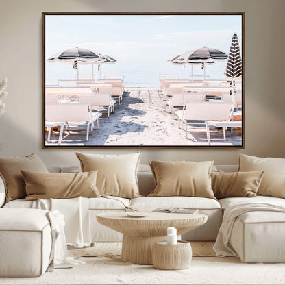 A serene minimalist beach scene featuring striped umbrellas, soft pastel sand, and an elegant lounge setup, creating a tranquil and stylish coastal retreat.