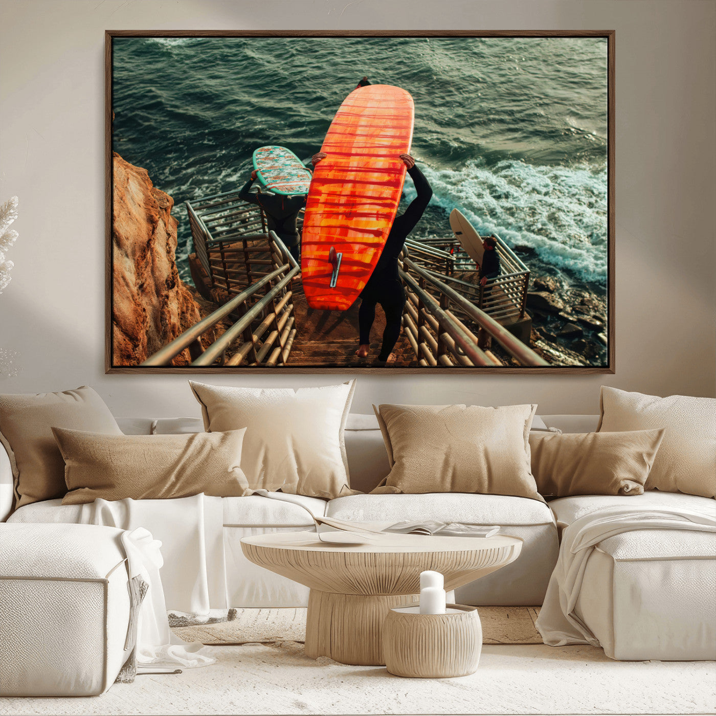 A surfer carrying a bold orange surfboard down a rugged staircase toward the ocean, bathed in golden hour light, capturing the energy of coastal adventure.