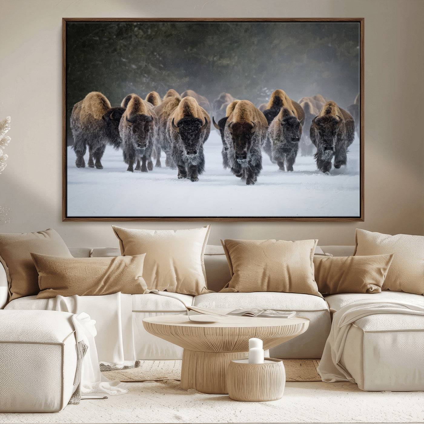 A herd of American bisons walking through deep snow in a forest, evoking a powerful rustic wilderness mood for western-style interiors.