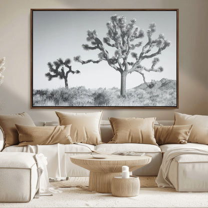 Black and white Joshua tree in a desert landscape with soft light and dry brush, perfect for rustic or minimalist home decor.