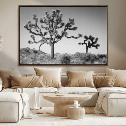 Black and white Joshua trees in a rugged desert landscape, creating a calm and minimalist feel for natural or rustic-themed interiors.