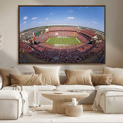 An William Brice-Stadium view of a full football stadium with cheering fans and clear blue skies, capturing the excitement and energy of the game.