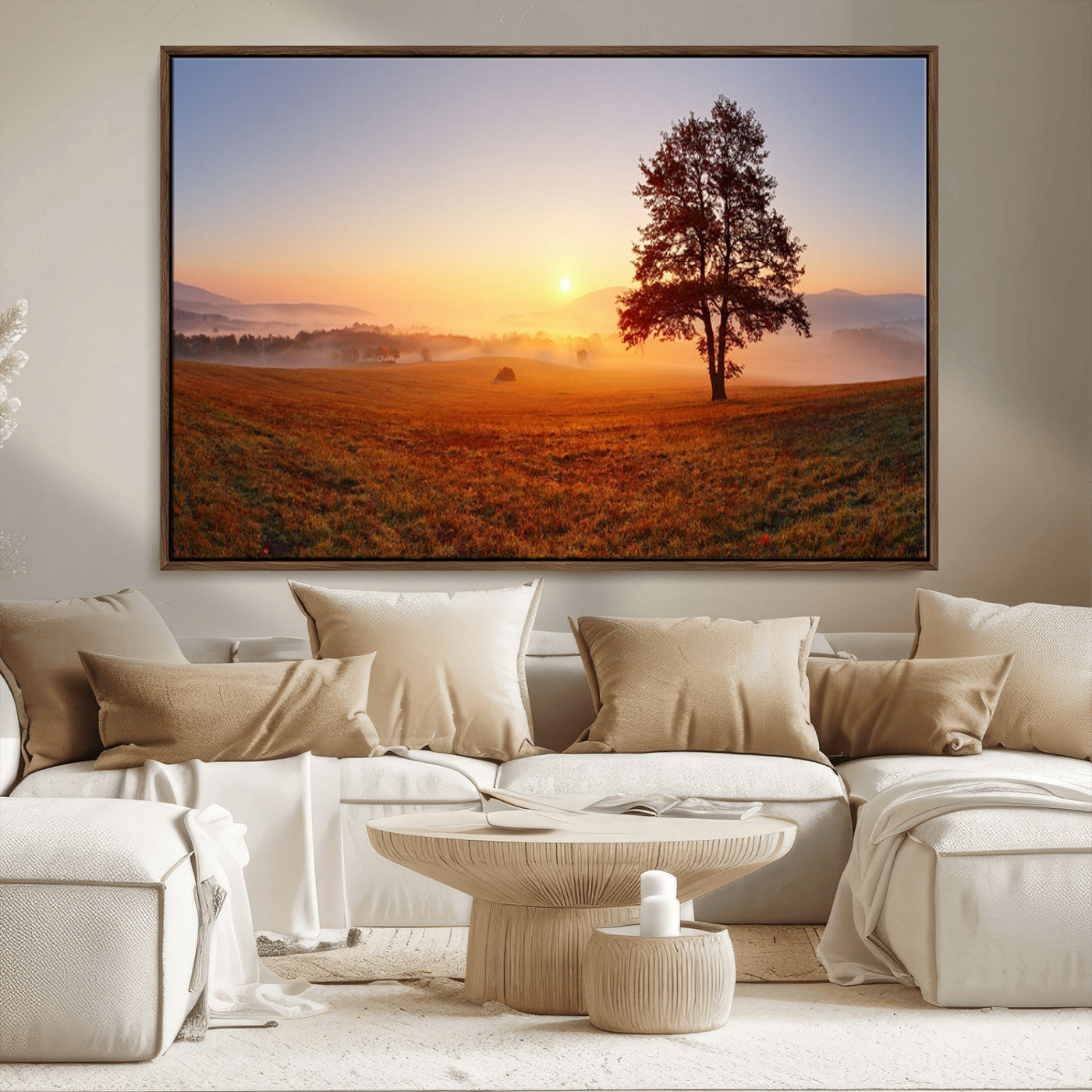 A tranquil landscape at sunrise with a mist-covered field and a lone tree, creating a peaceful and natural atmosphere.