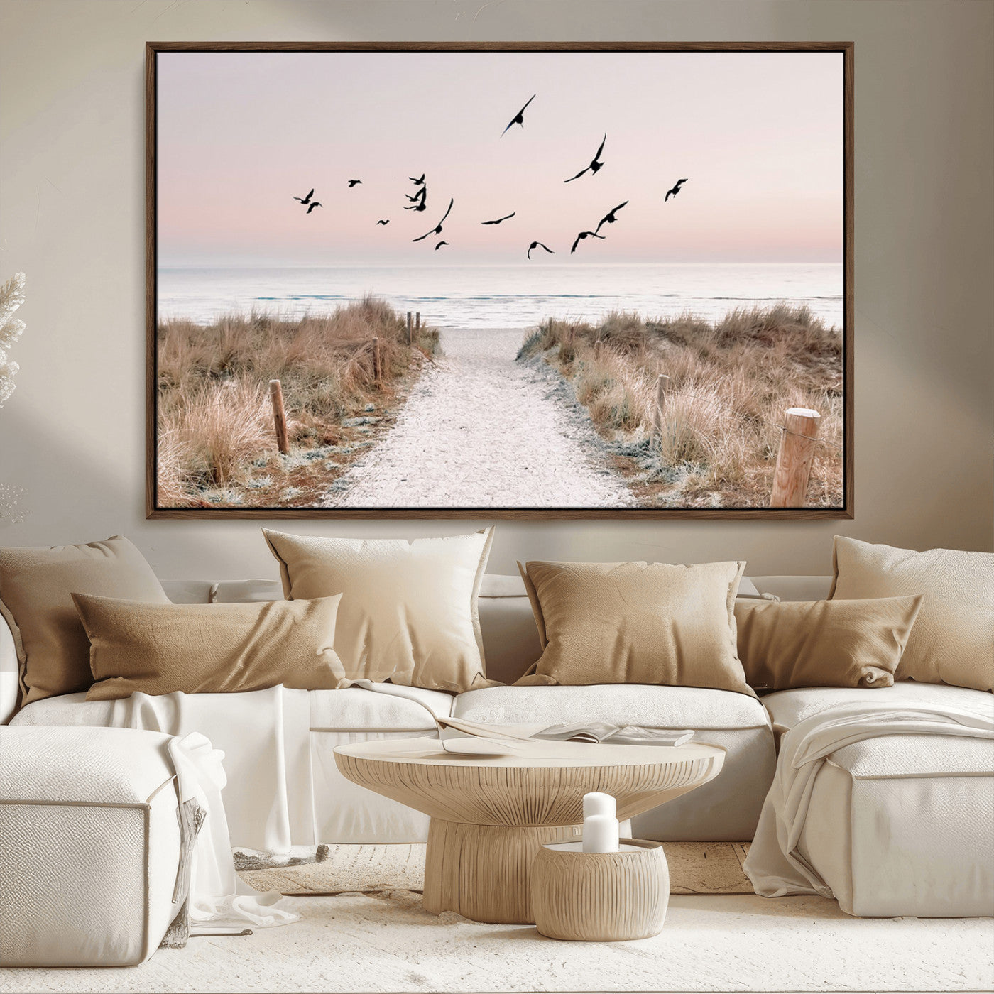 A peaceful coastal pathway leading to the ocean, with birds flying across a soft pastel sky, creating a calm and scenic beach atmosphere.